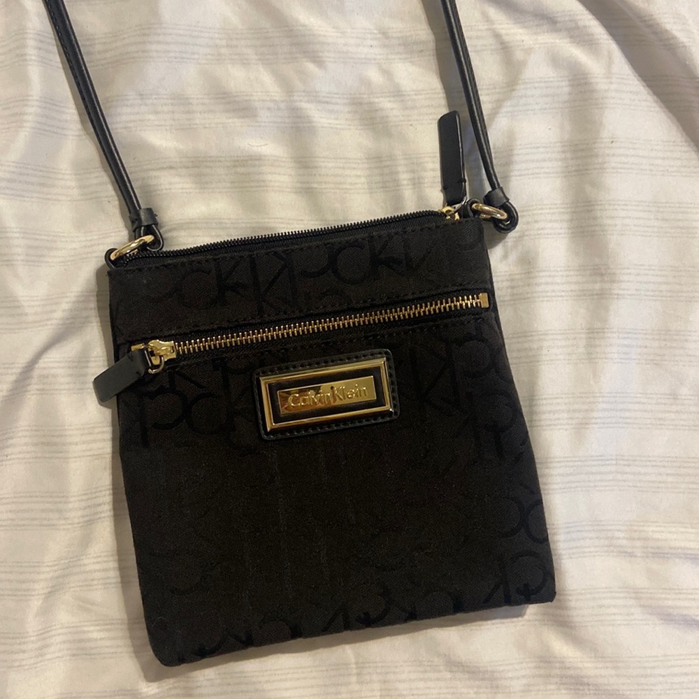 CALVIN KLIEN black and gold handbag, long handle with multiple pockets in & out